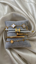 Gold and White Bracelet Stack